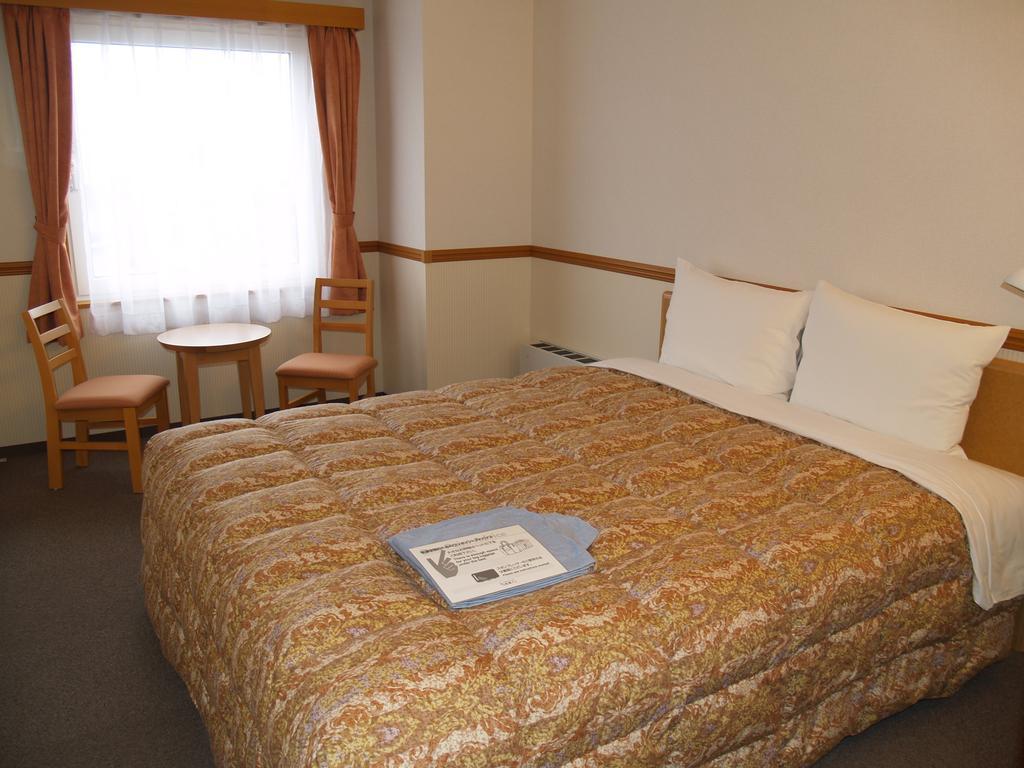 Hotel Route-Inn Fukui Ekimae Quarto foto